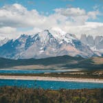 Scenic landscape of Torres del Paine mountains and lake in Chilean Patagonia.